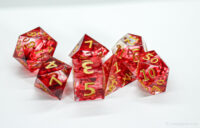 Red swirling translucent sharp-edged dice