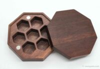 Octagonal wooden box with dice 10